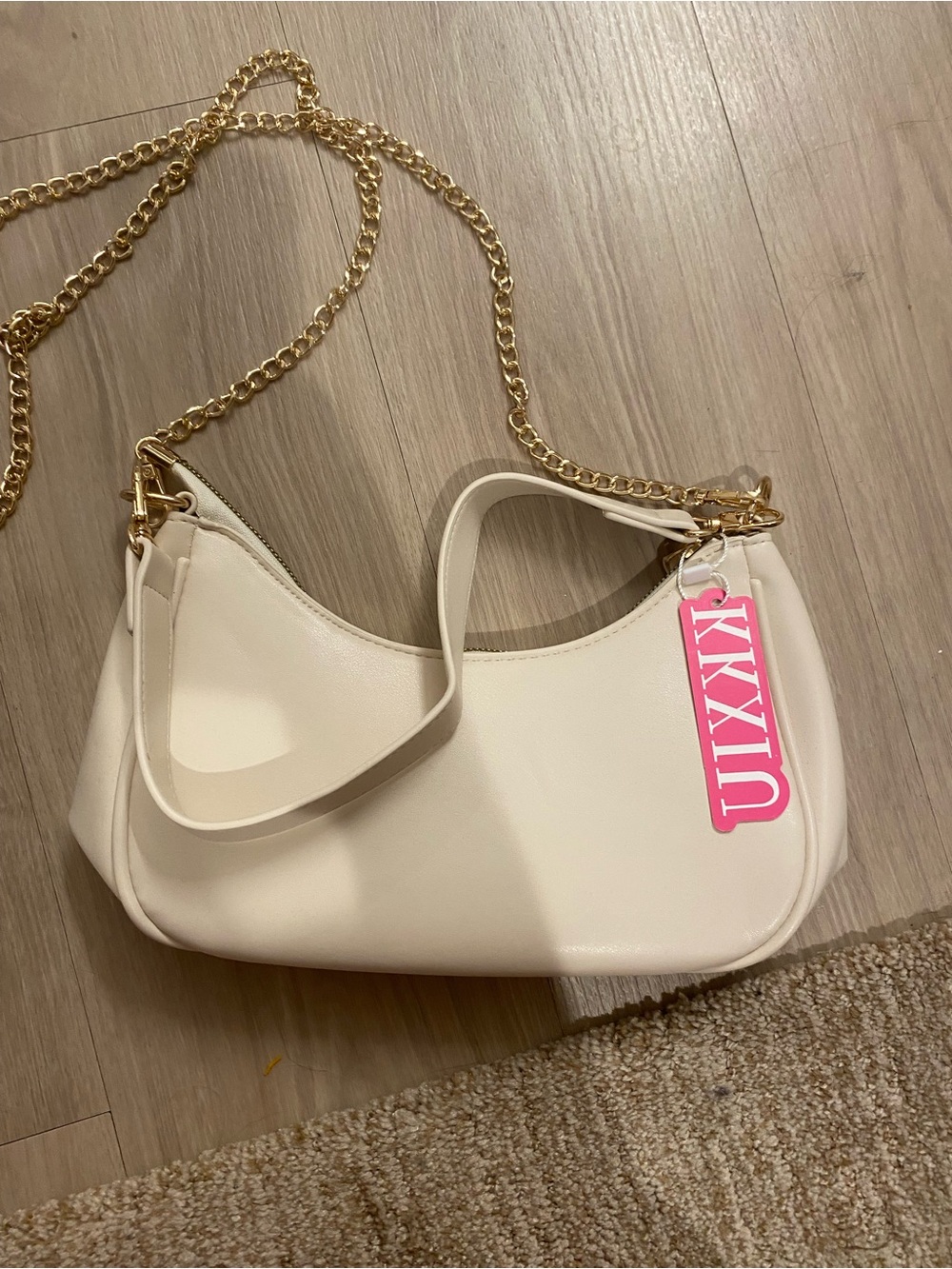 Amazon Cream Crossbody Bag with Gold Chain and Pink Tag